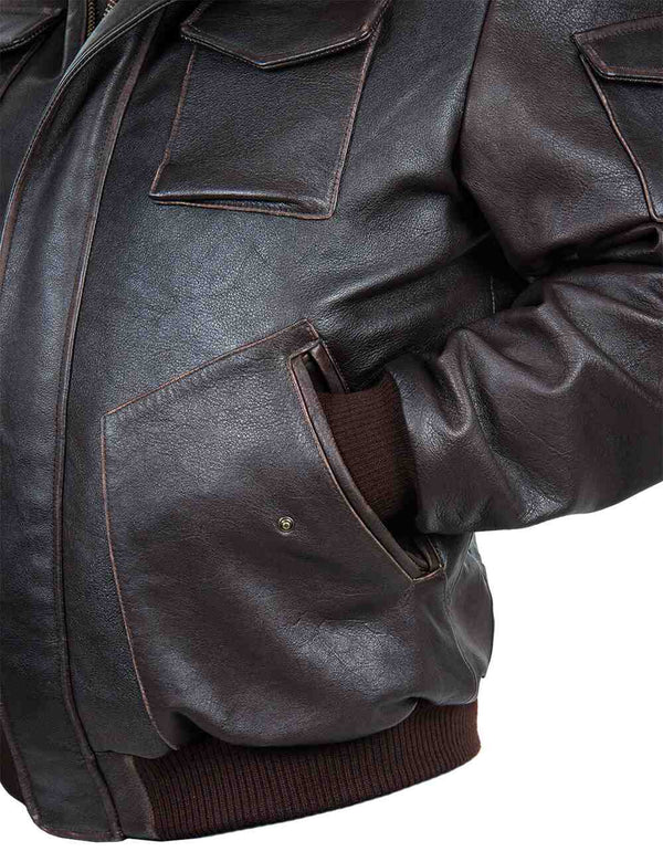 The left side of a short brown leather men's jacket, the sleeve is in the pocket.