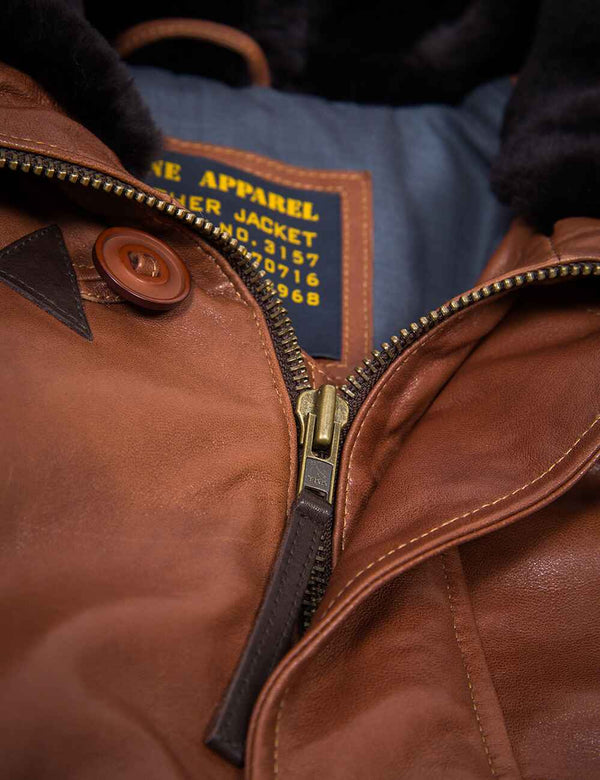 Metal zipper men's light brown leather parka with hood.