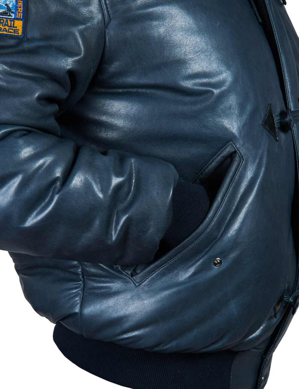 A pocket and a sleeve of men's blue short leather parka.