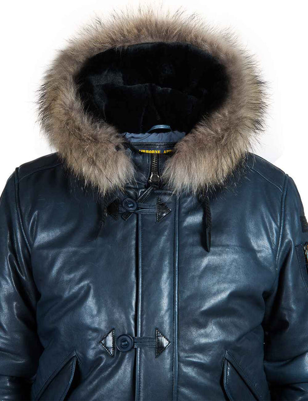 Top part of men's blue leather parka with raccoon fur trimmed hood.