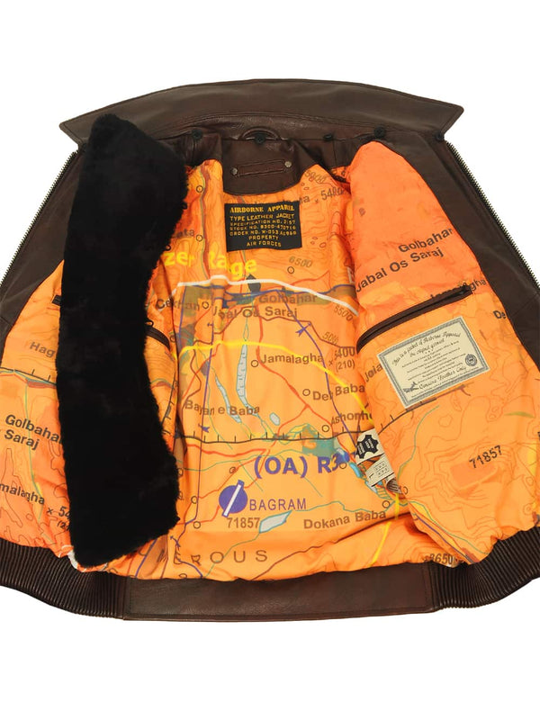 Men's brown leather jacket, unbuttoned, with a collar unbuttoned, revealing a bright lining and interior pockets.