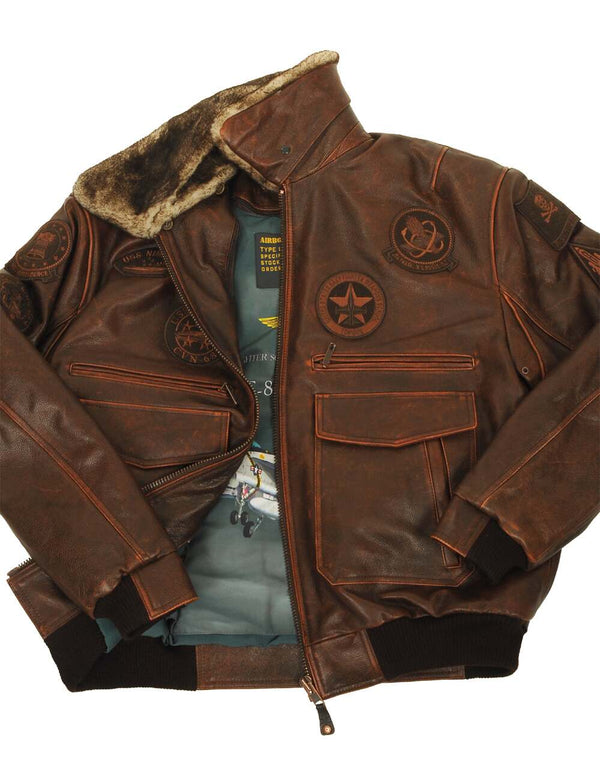 Brown men's leather jacket with patches and fur collar, unbuttoned.