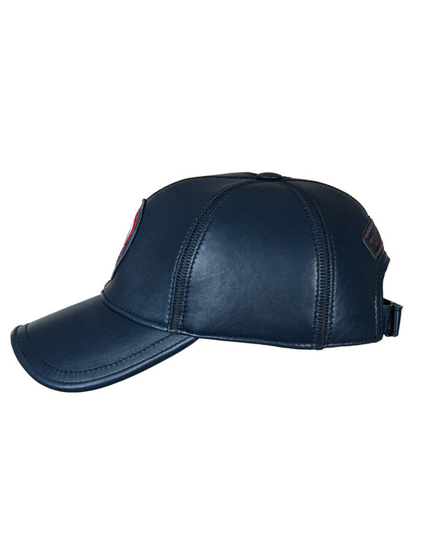 Navy blue leather men's cap with a patch on the front part, side view.