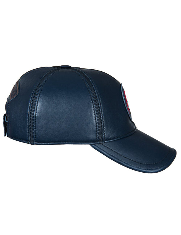 Navy blue leather men's cap with a patch on the front part, side view.