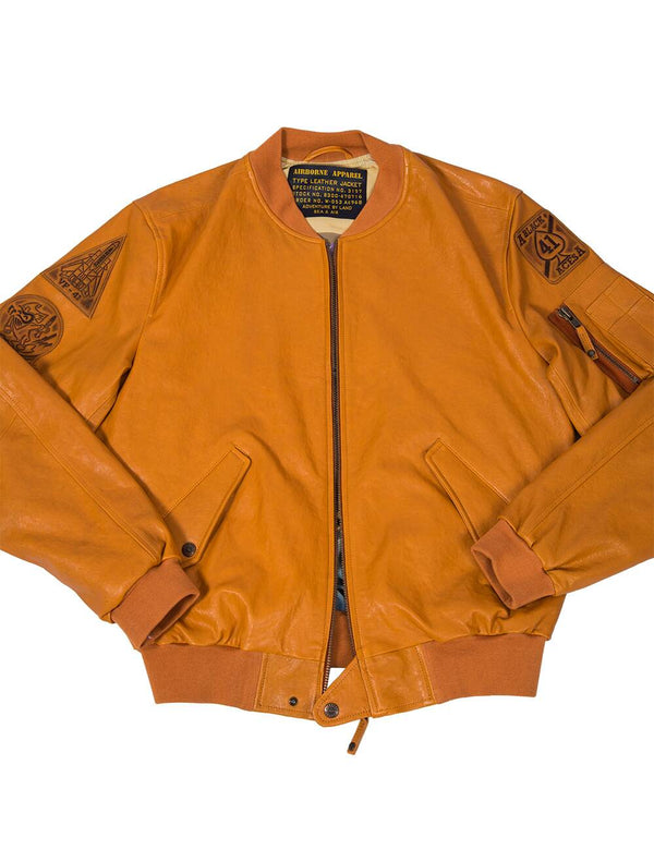 Men's leather jacket with elastic band in orange color.