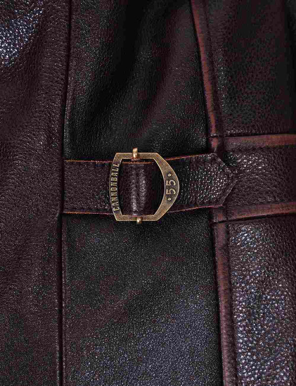 Side strap of men's brown leather jacket.
