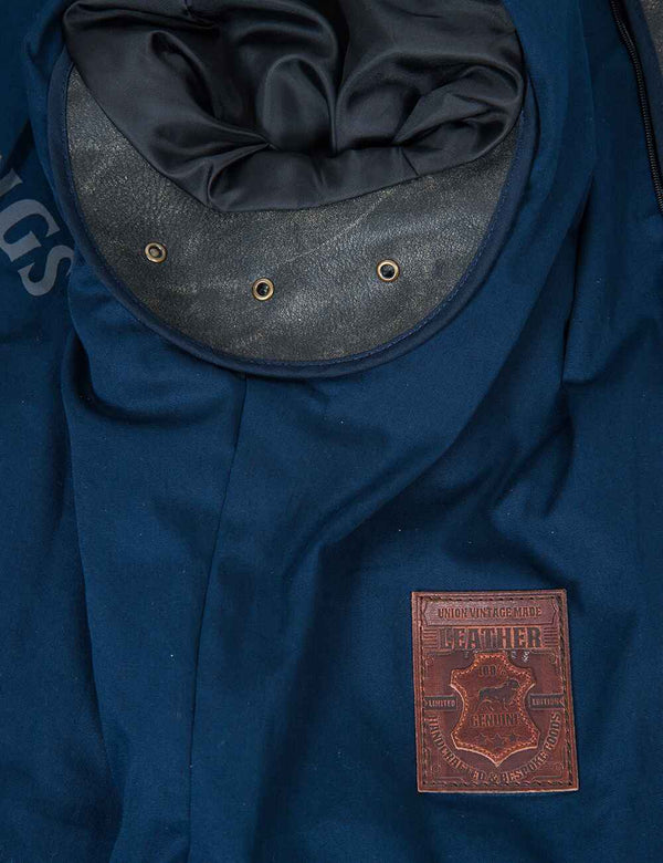 The inside of the sleeve and armpits of a leather jacket.