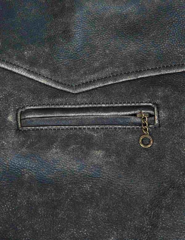Chest pocket of a black men's leather jacket with bleached seams.