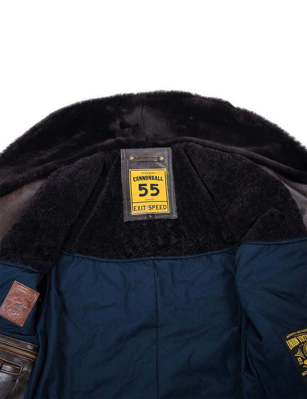 Yellow tag on the lining of a men's brown leather jacket.