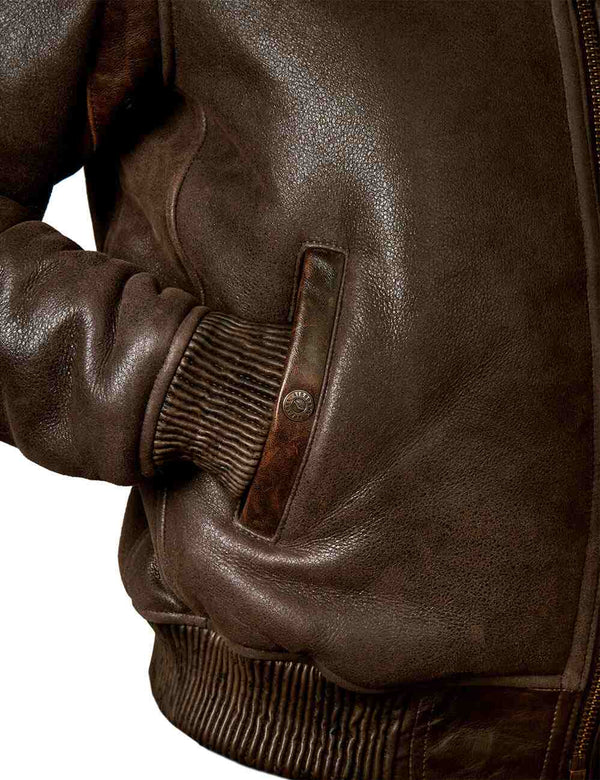 Pocket of a men's brown sheepskin coat.