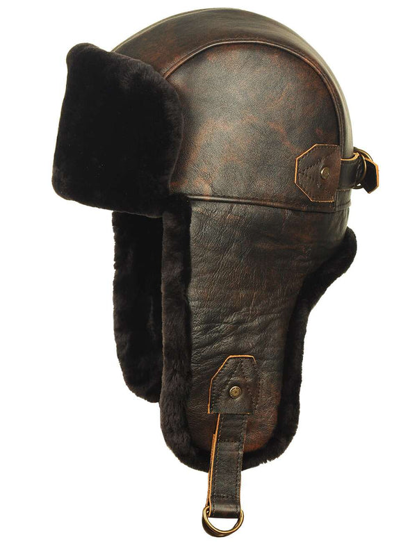 Men's brown trapper hat with leather top and sheepskin lining side view