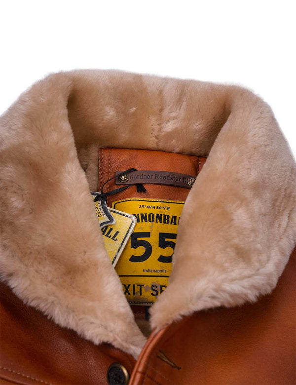 Fur collar of men's light brown leather jacket.