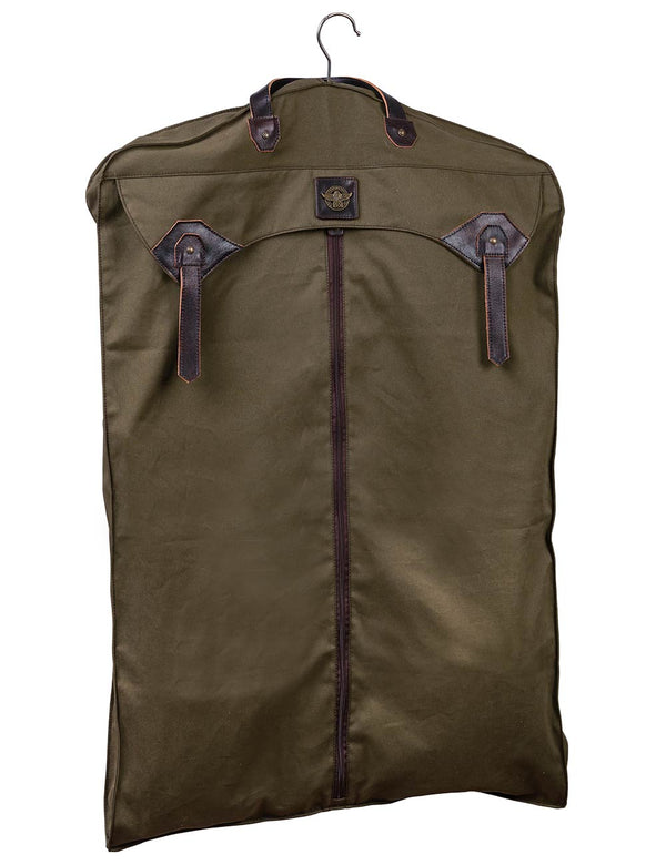 Olive green garment bag hanging vertically from a hook, displaying the full length and central zipper with dark brown leather accents.