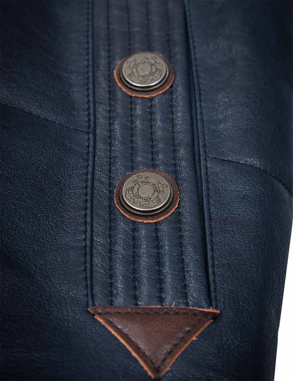 Metal buttons on the pocket of a dark blue leather men's vest.