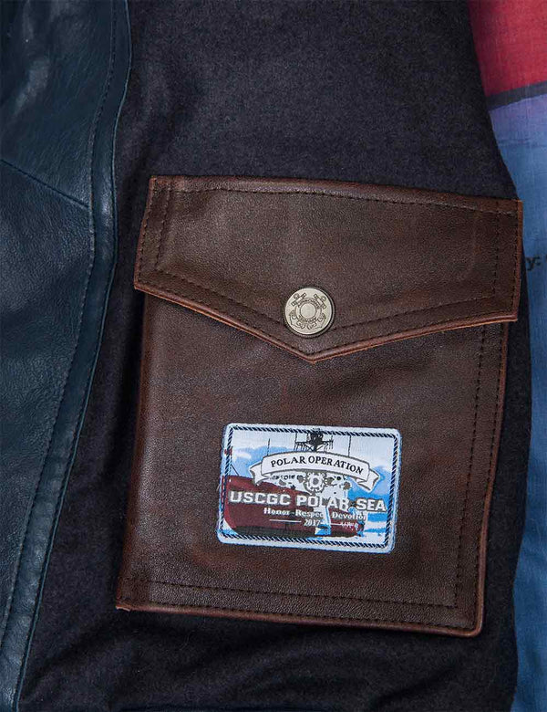 An inside pocket of a dark blue leather men's vest.