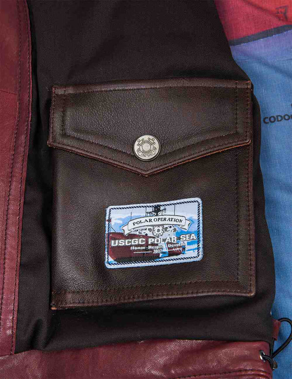 An Inside pocket with a patch of the men's burgundy leather vest.