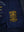 A bright patch on the blue lining inside a men's leather jacket with an elastic waistband.