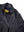 Patches in the form of letters C, B and numbers 09 on a men's black leather jacket.