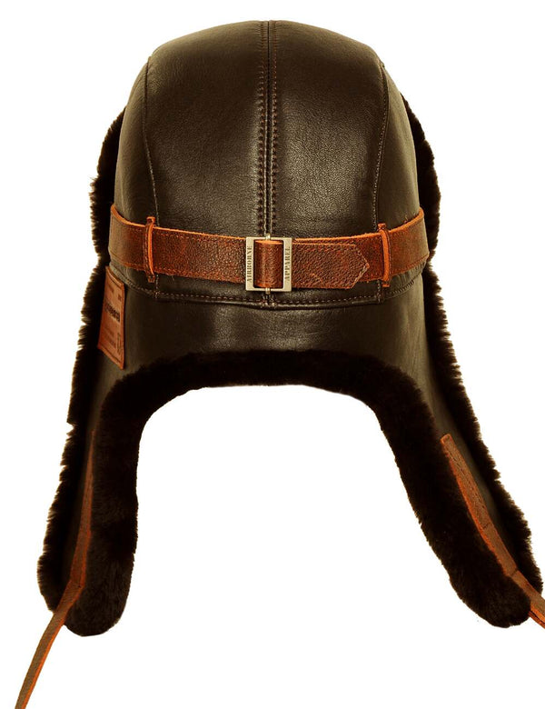 Men's brown leather trapper hat with sheepskin lining, back view.