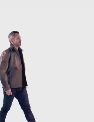 The man shows an olive leather jacket.