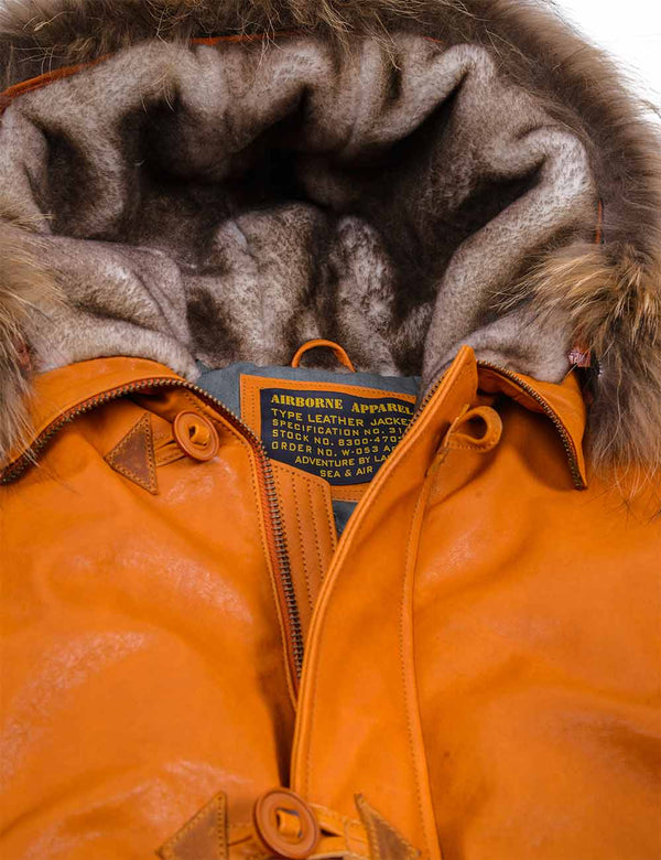 Men's orange leather jacket with sheepskin lined hood.