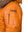 Utility pocket and a patch on the left sleeve of men's orange leather hooded jacket.