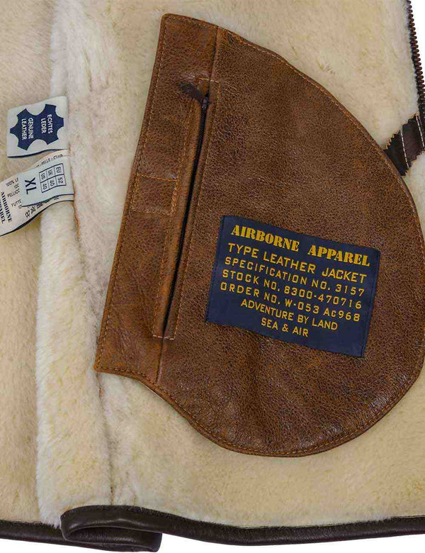 Inside pocket with a patch of the men's light brown sheepskin vest.