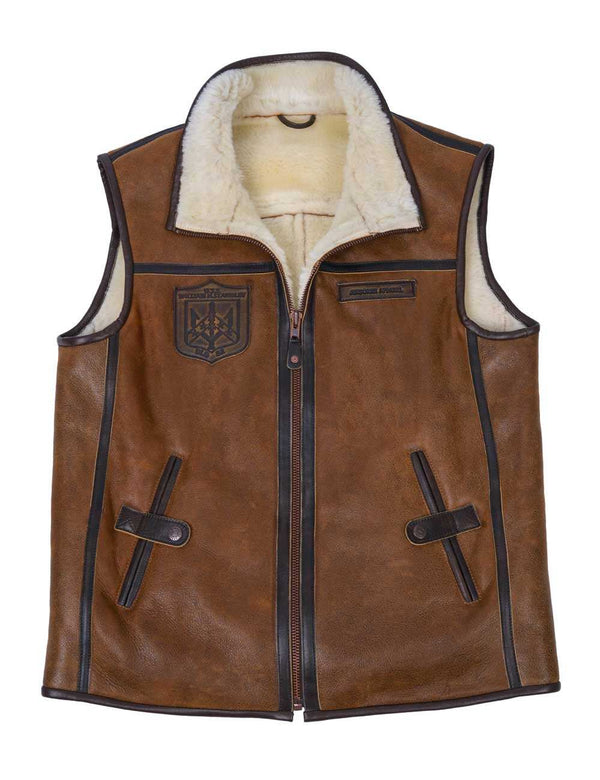 Men's light brown sheepskin vest with light fur and a patch on the chest.