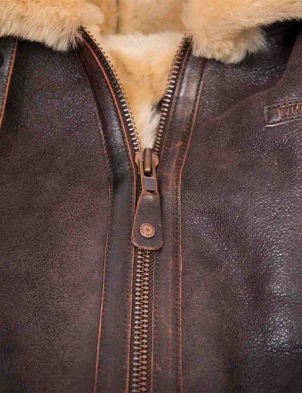 Metal zipper on sheepskin jacket.